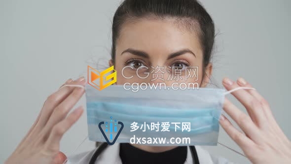 年轻女医生示范怎样带好口罩防止COVID-19防护措施4K实拍视频素材下载