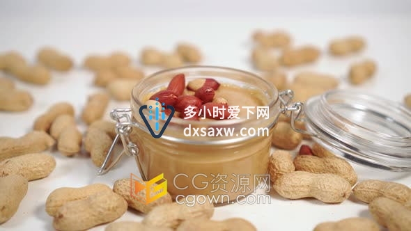 实拍素材-玻璃罐中的花生酱罐头内外一堆花生坚果特写